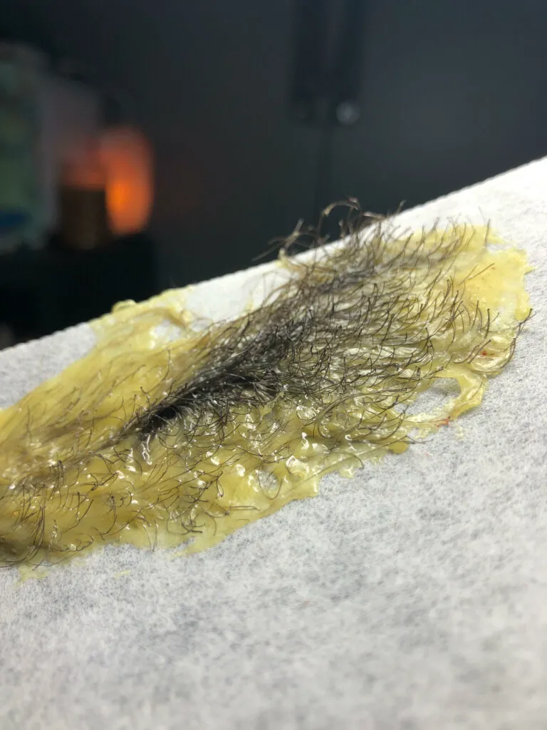 Brazilian Wax Pull at Kissed Peach